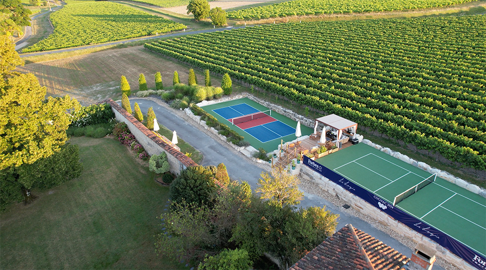 Le Logis' pickleball courts are surrounded by a Cognac vineyard.