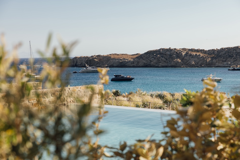 The New Mykonos Resort With A Water Limo And A Basketball Court Carved From Rock
